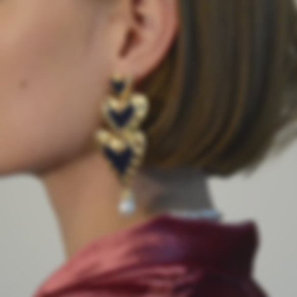 Model wearing Party Love Heart Earrings by Margot Bardot