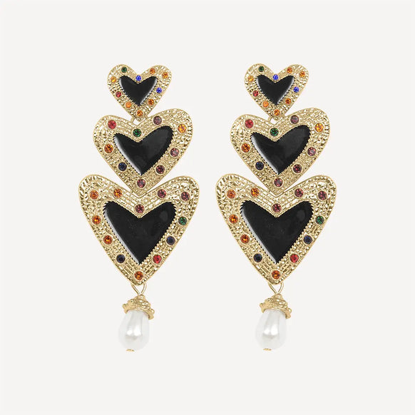 A pair of Party Love Earrings - Heart Shaped Earrings by Gold Margot Bardot Online